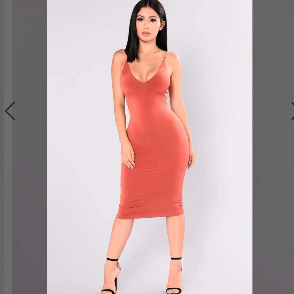 Rust midi dress. So flattering! Only worn once!